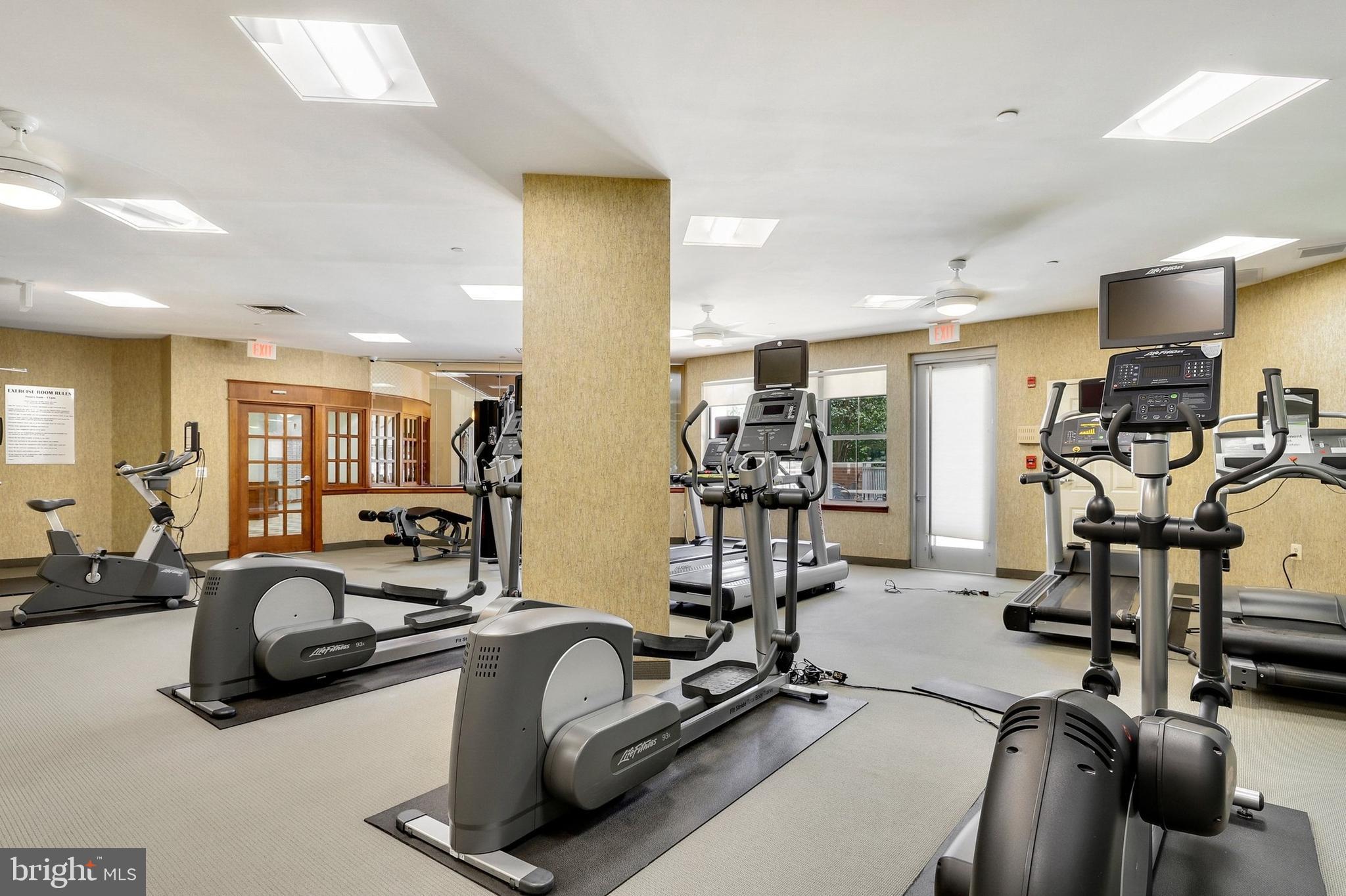 11800 Sunset Hills Road, Unit 726 Reston, VA 20190 - Photo 23 of 36 a view of a room with gym equipment