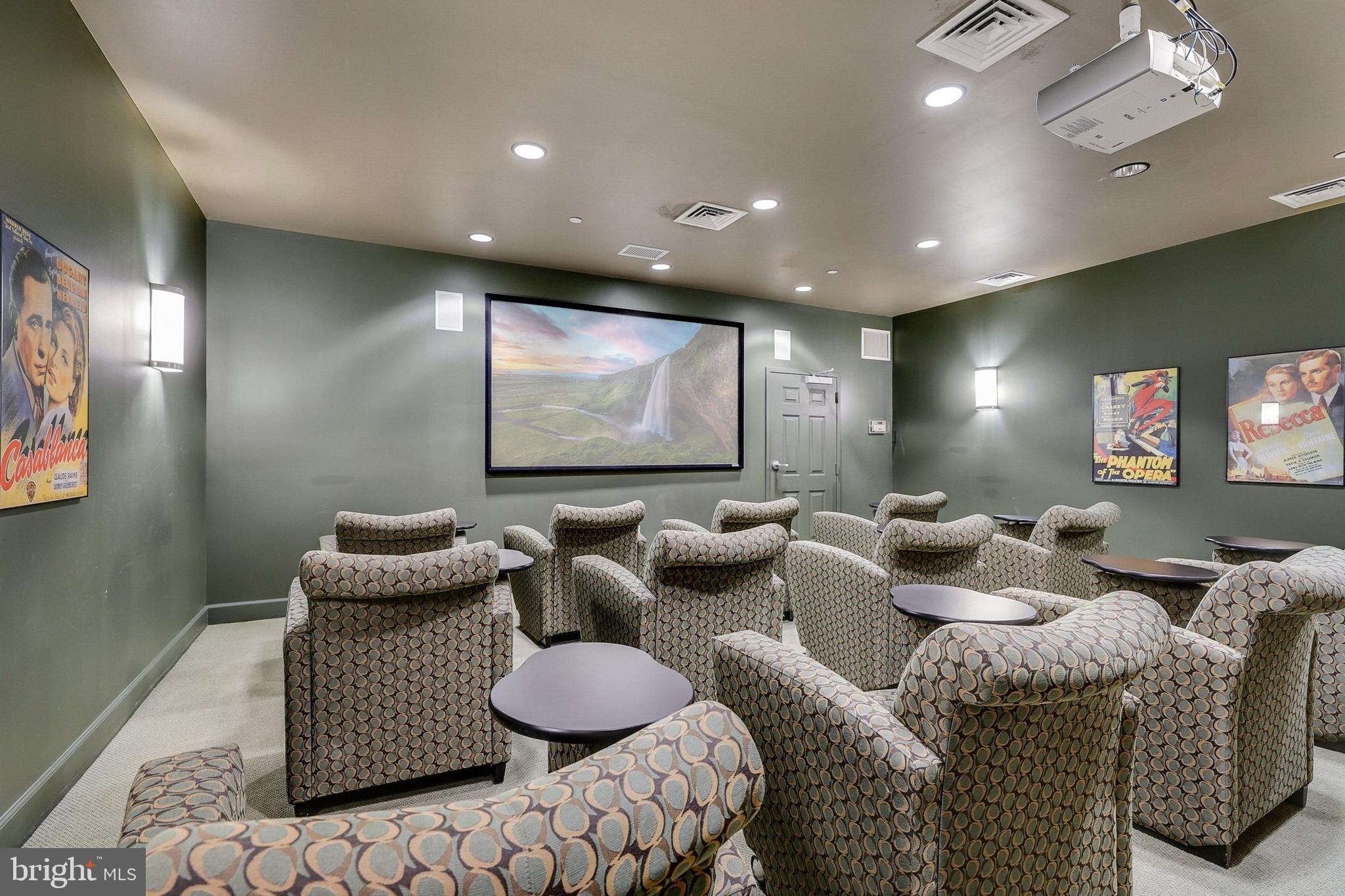 11800 Sunset Hills Road, Unit 726 Reston, VA 20190 - Photo 26 of 36 a living room with furniture and a flat screen tv