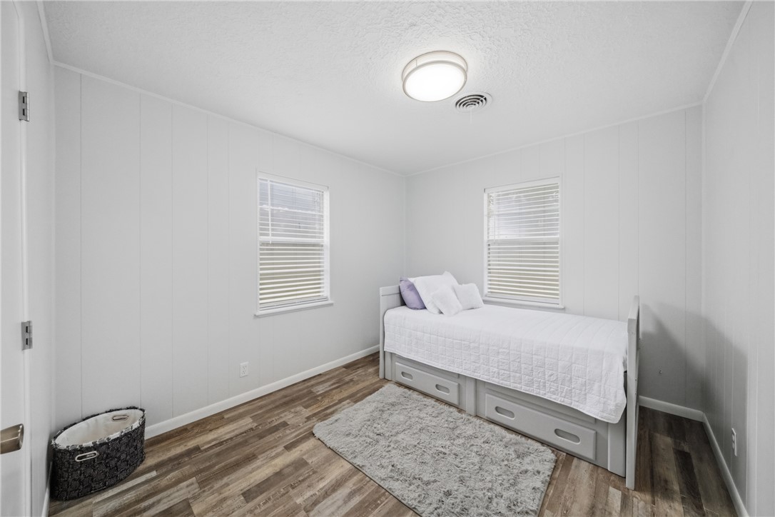 415 West Decherd Street Franklin, TX 77856 - Photo 14 of 28 a bedroom with a bed and a window