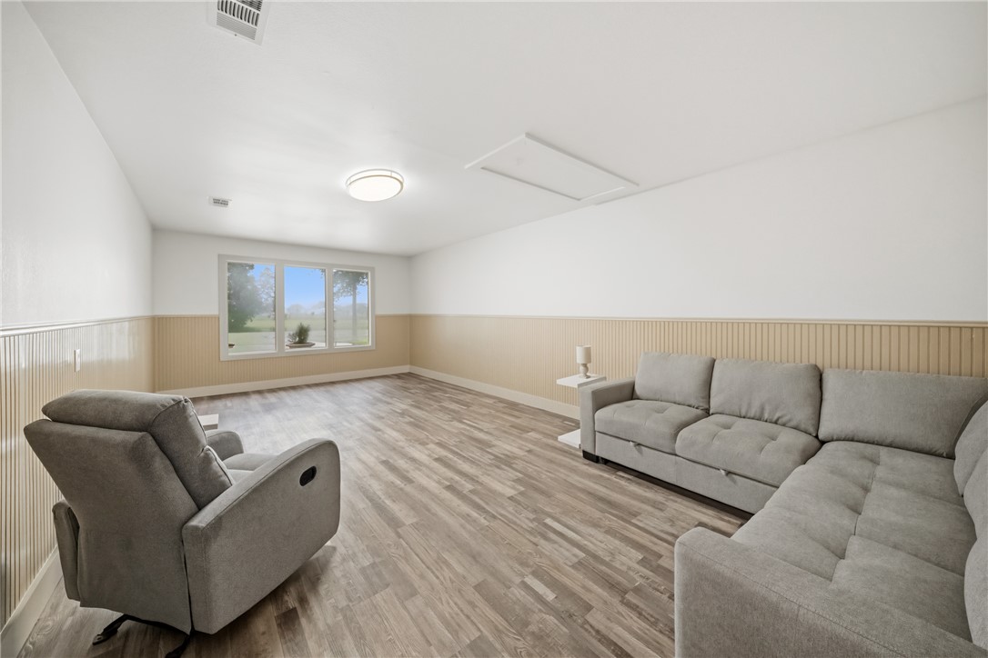 415 West Decherd Street Franklin, TX 77856 - Photo 20 of 28 a living room with furniture and a couch