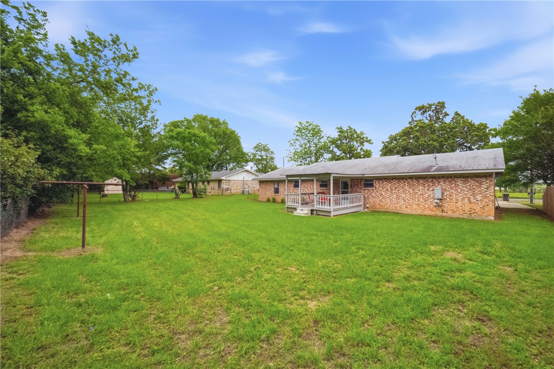 415 West Decherd Street Franklin, TX 77856 - Photo 26 of 28 a view of a house with a yard