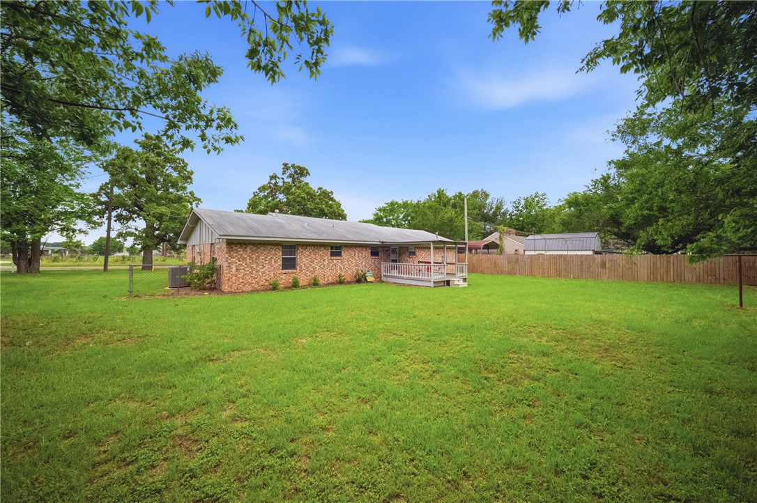 415 West Decherd Street Franklin, TX 77856 - Photo 27 of 28 a view of a house with a garden