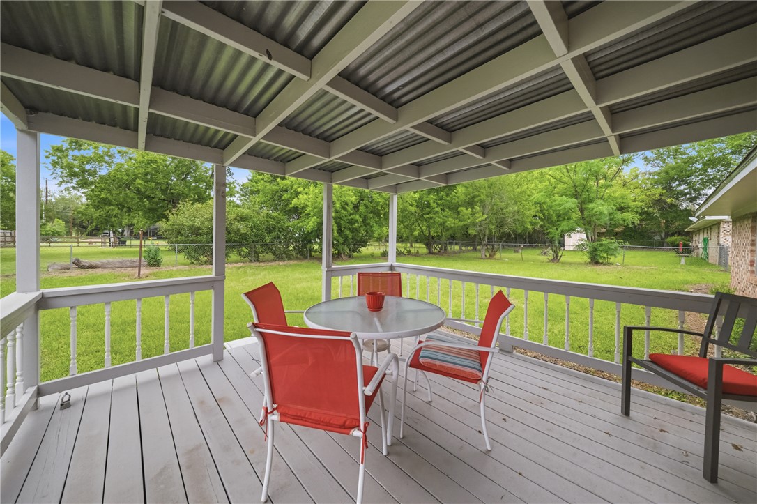 415 West Decherd Street Franklin, TX 77856 - Photo 3 of 28 a view of a chair and table in the balcony