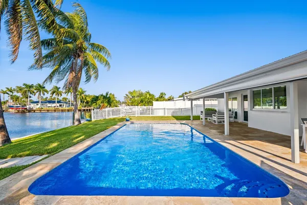 a view of a house with a swimming pool