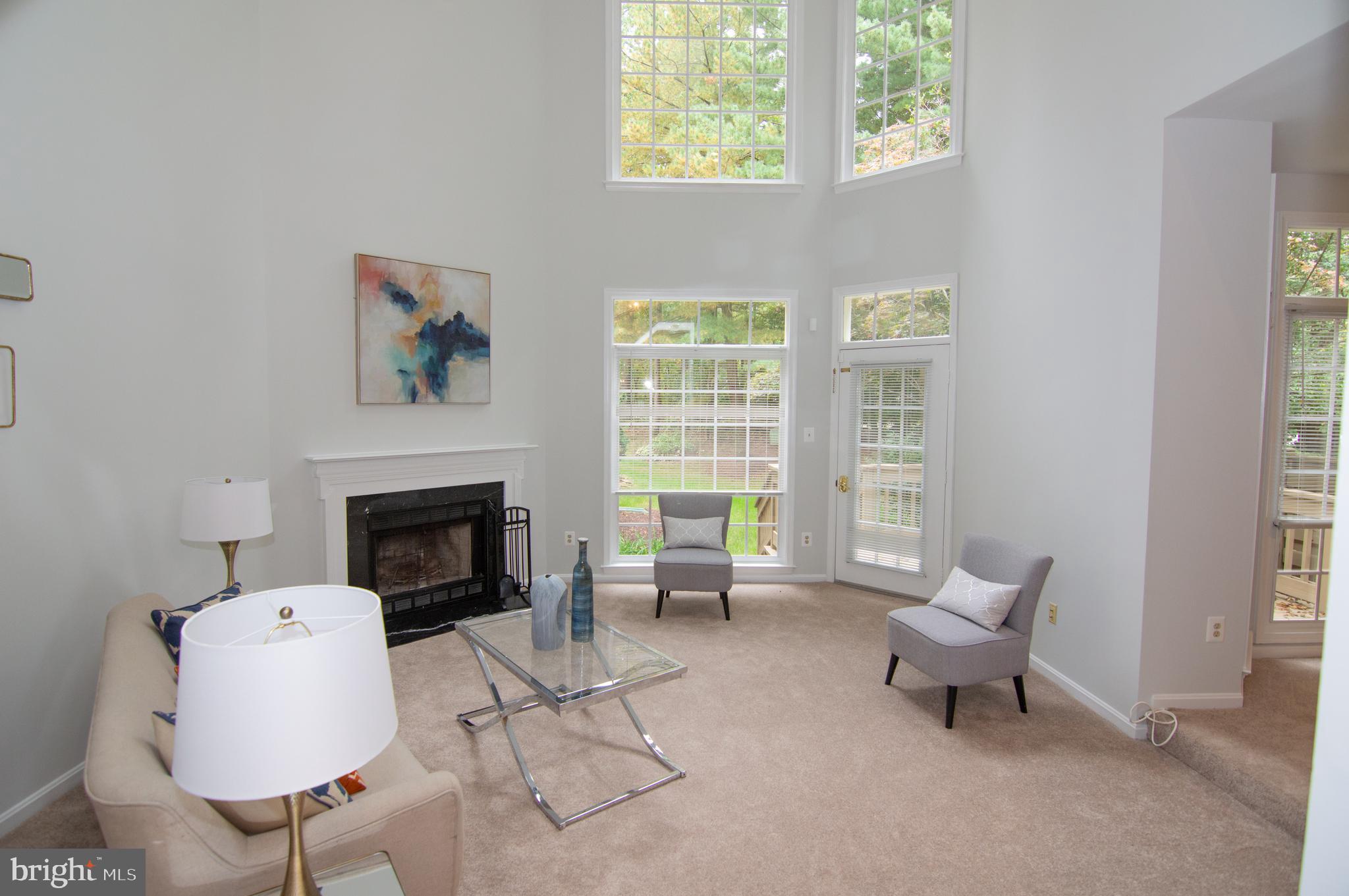 11415 Hollow Timber Way Reston, VA 20194 - Photo 16 of 50 Living Room w/ Wood-Burning Fireplace