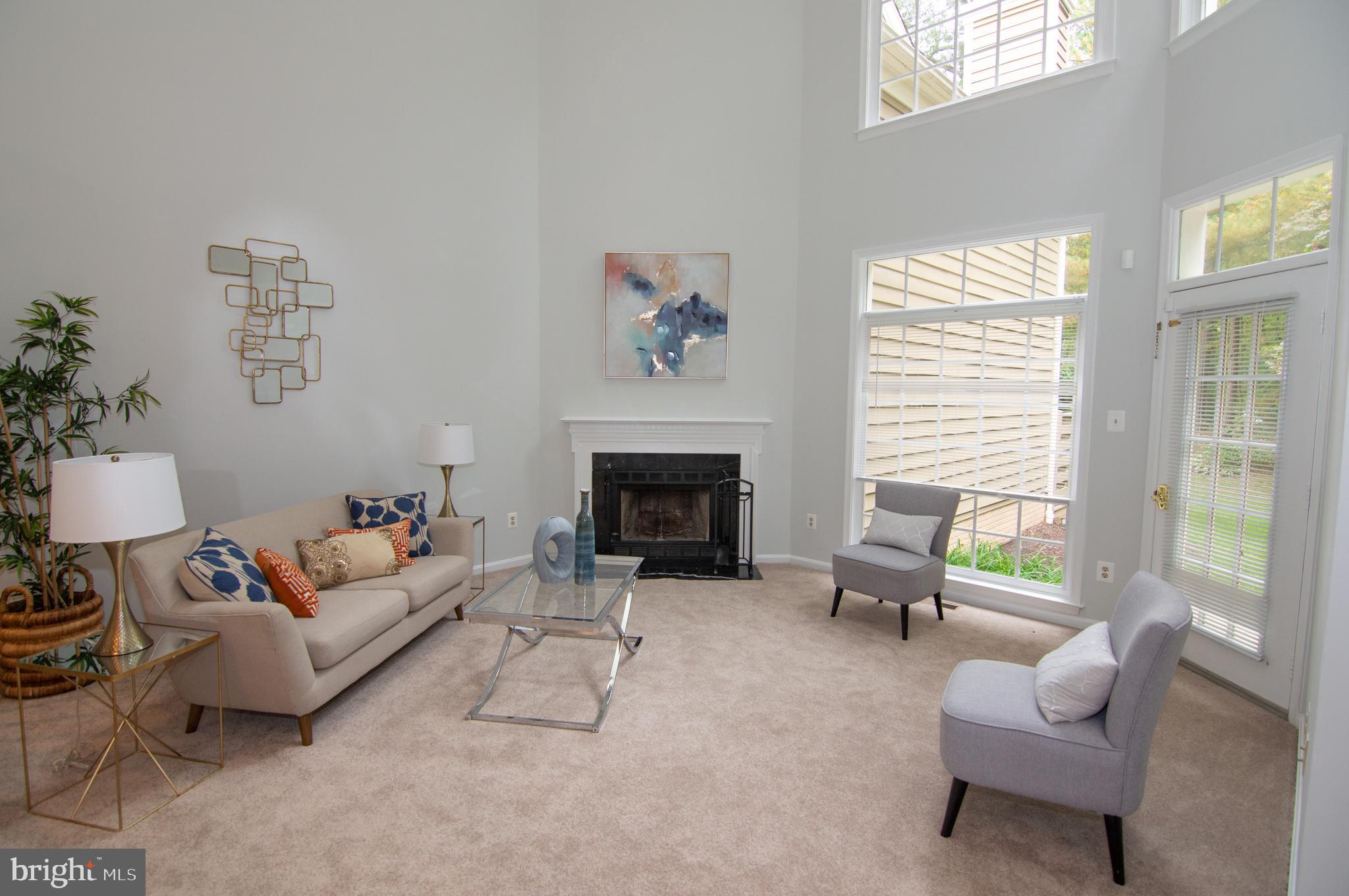 11415 Hollow Timber Way Reston, VA 20194 - Photo 17 of 50 Living Room w/ Wood-Burning Fireplace