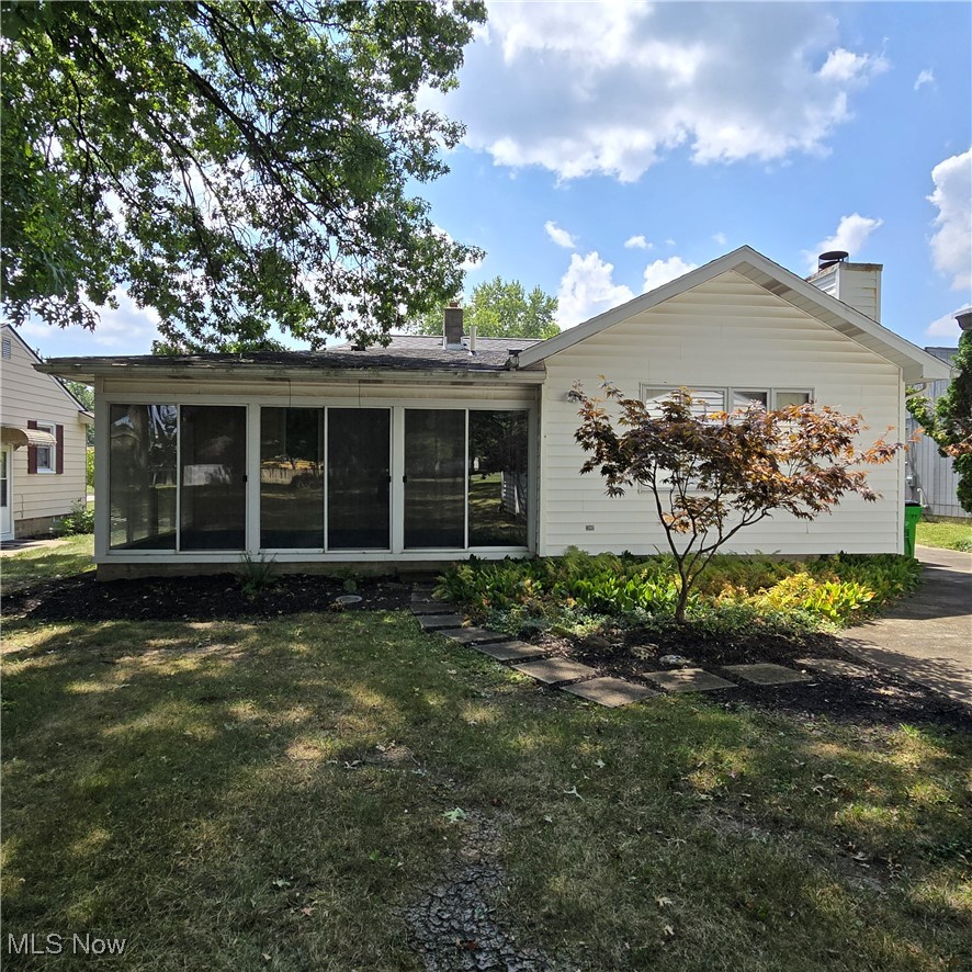 2317 Liberty Road Stow, OH 44224 - Photo 2 of 29 Back of house with a sunroom
