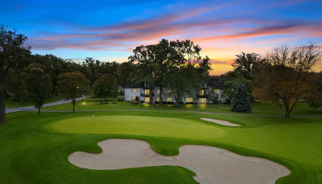 a view of a golf course with a garden