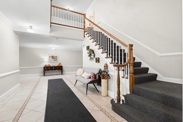 a view of entryway livingroom and hall