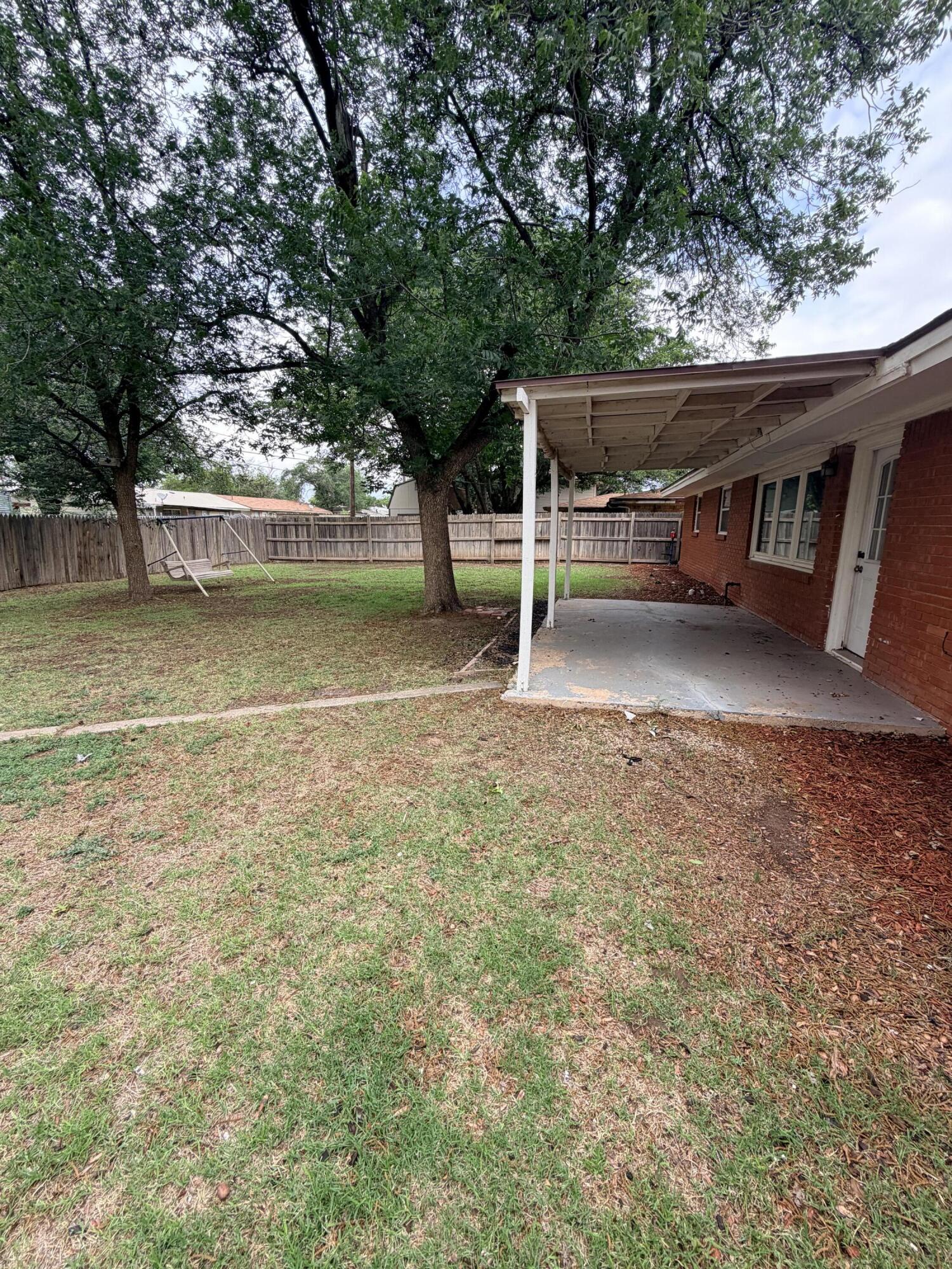 3814 27th Street Lubbock, TX 79410 - Photo 22 of 24 a view of a house with swimming pool