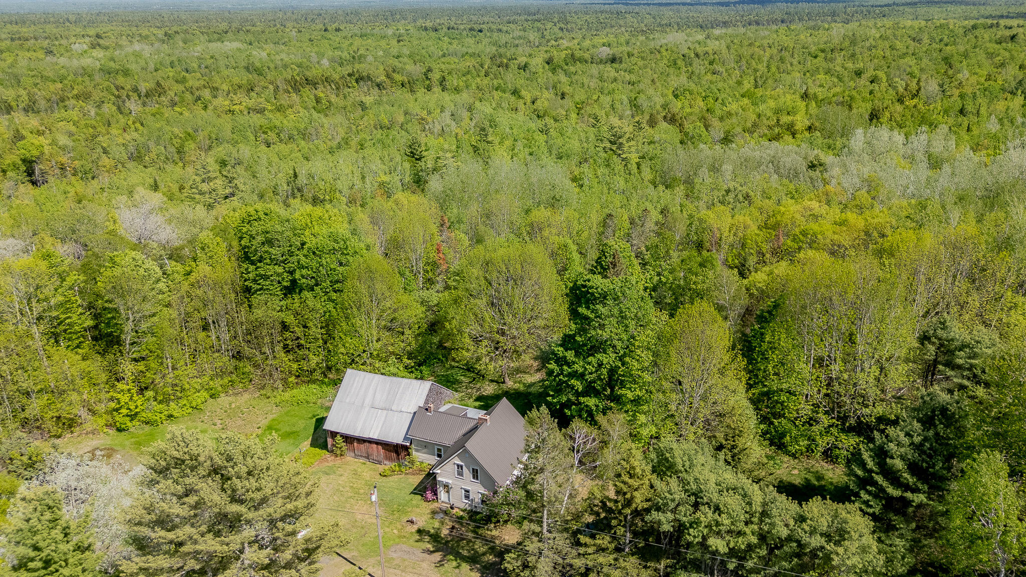 1017 Howland Road Lagrange, ME 04453 - Photo 2 of 88 DJI_20260526150412_0436_D