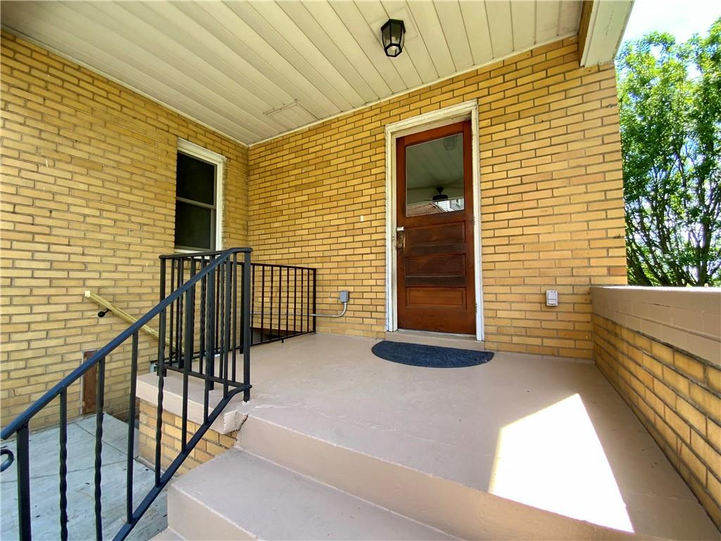 629 Ridge Road Ambridge, PA 15003 - Photo 30 of 38 Back entrance with freshly painted hand rails