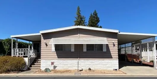 a front view of a house with garage