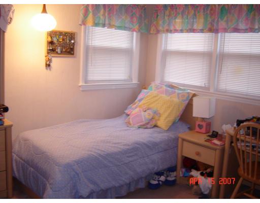 17 Waring Road Natick, MA 01760 - Photo 5 of 13 a bedroom with a bed and a window