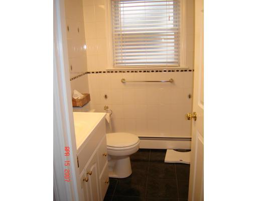 17 Waring Road Natick, MA 01760 - Photo 6 of 13 a bathroom with a sink and a toilet