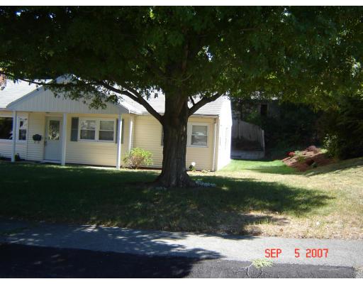 17 Waring Road Natick, MA 01760 - Photo 8 of 13 a front view of a house with garden