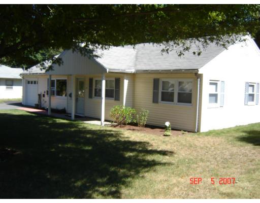 17 Waring Road Natick, MA 01760 - Photo 9 of 13 a view of a house with backyard and garden