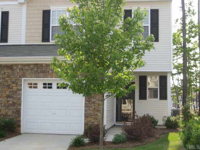 8237 Martello Lane Raleigh, NC 27613 - Photo 9 of 10 front view of a house with a tree