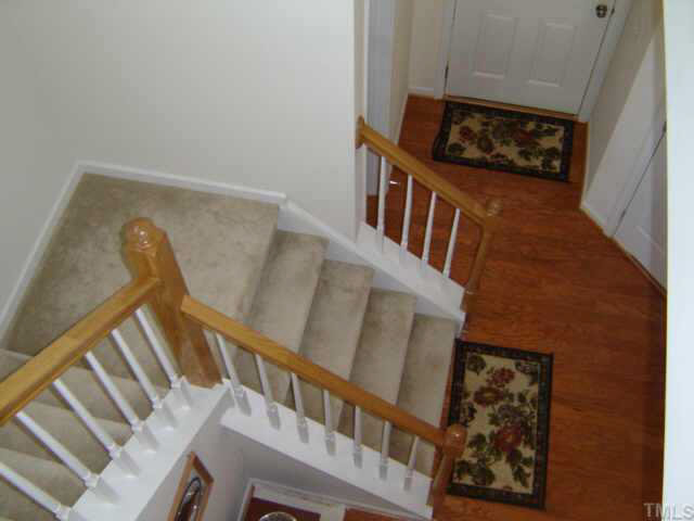 8237 Martello Lane Raleigh, NC 27613 - Photo 3 of 10 a view of stairs