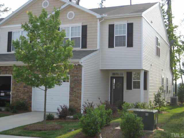 8237 Martello Lane Raleigh, NC 27613 - Photo 10 of 10 a front view of a house with garden