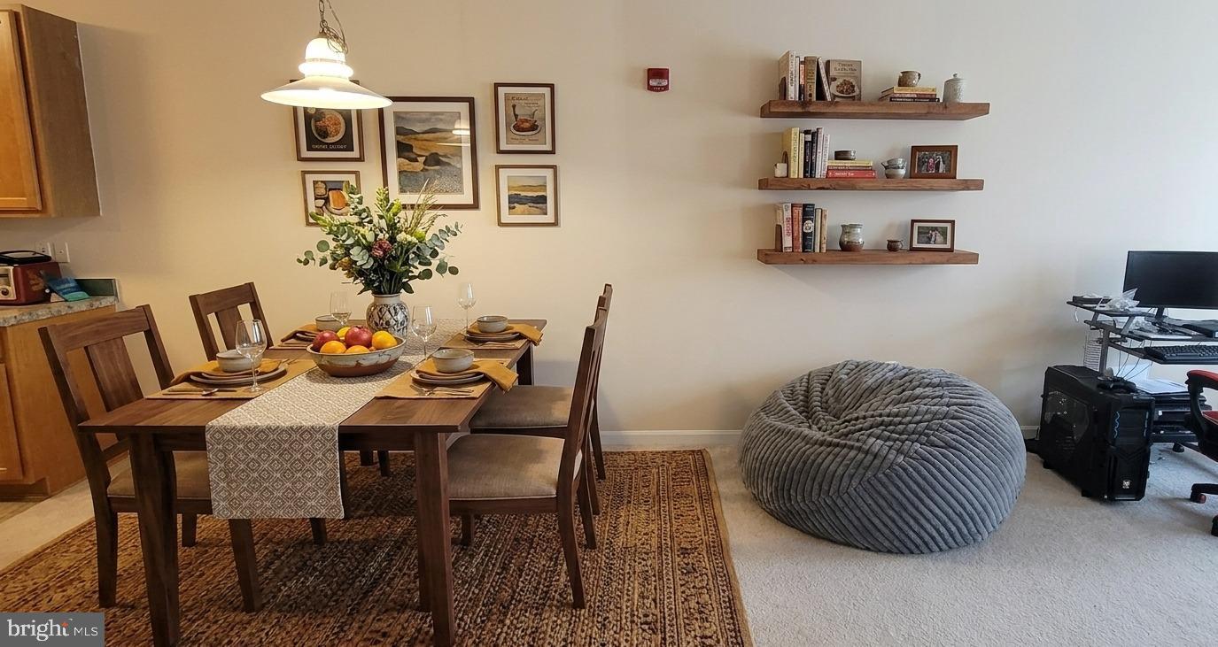 356 Main Street, Unit 300 Gaithersburg, MD 20878 - Photo 8 of 23 Charming dining space with cozy accents.
