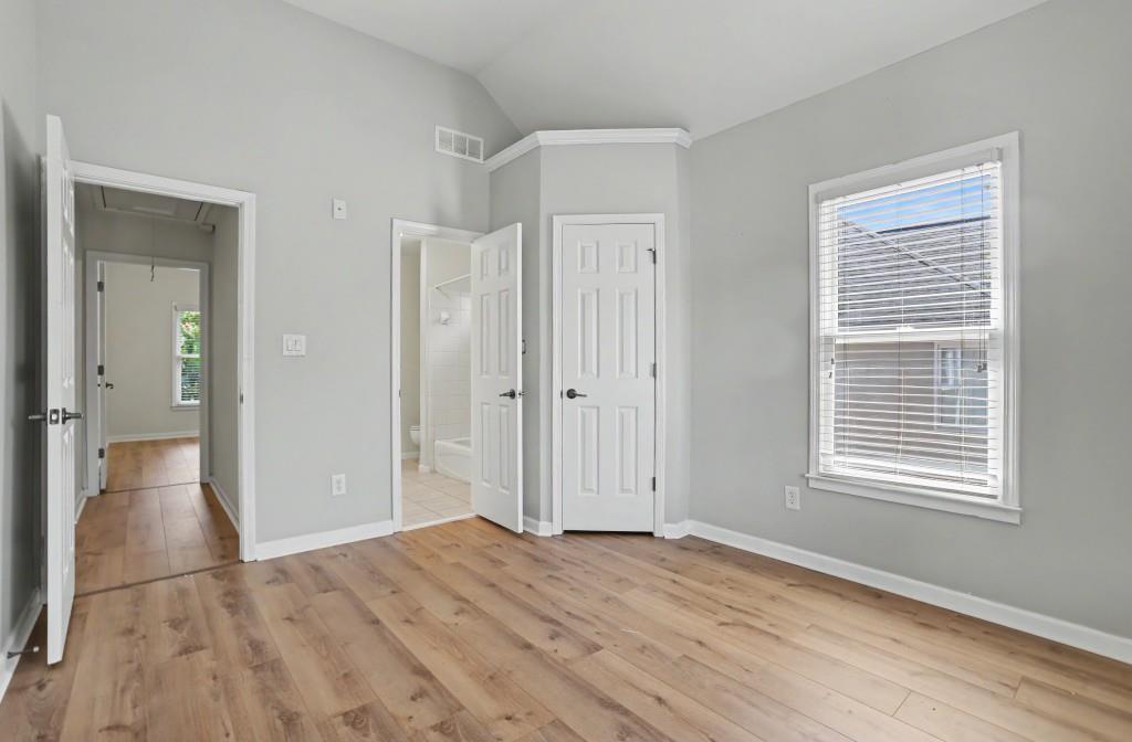 2123 Floral Ridge Drive Dacula, GA 30019 - Photo 41 of 56 a view of empty room with wooden floor and fan