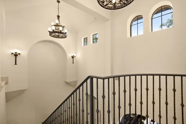 a view of a hallway with windows