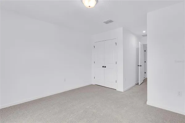 a view of a room with storage and racks