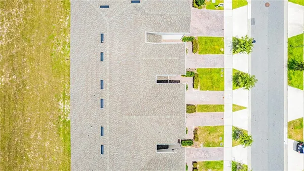 a view of swimming pool with outdoor seating