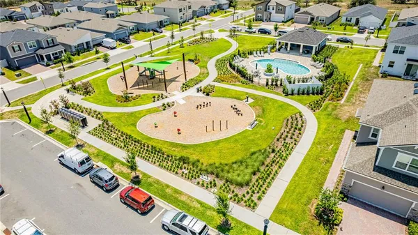 a view of a swimming pool with a patio