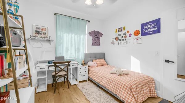 a bedroom with furniture and a bed