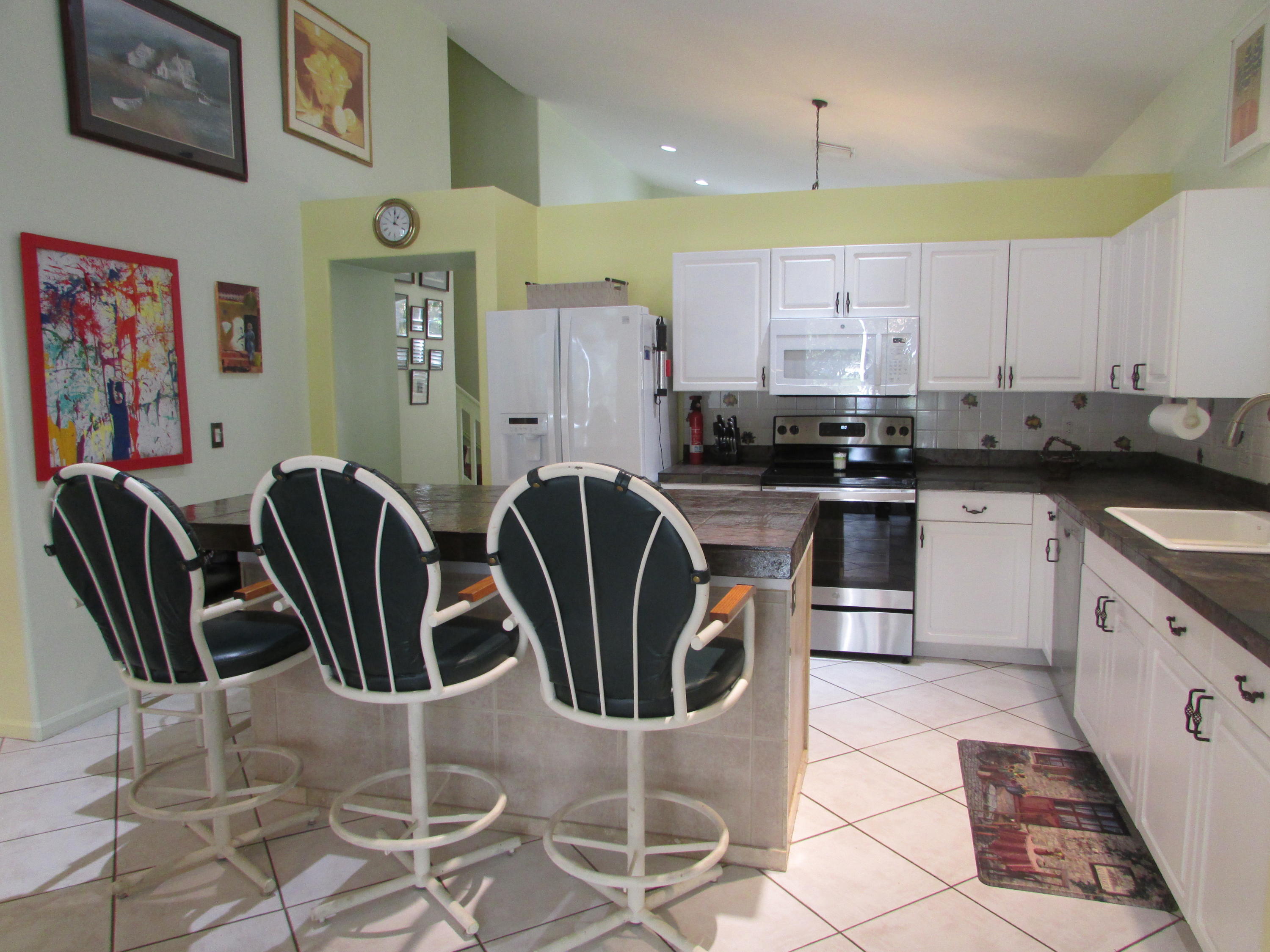 1071 Aspri Way Riviera Beach, FL 33418 - Photo 8 of 31 Kitchenviewfromoffice1071Aspri