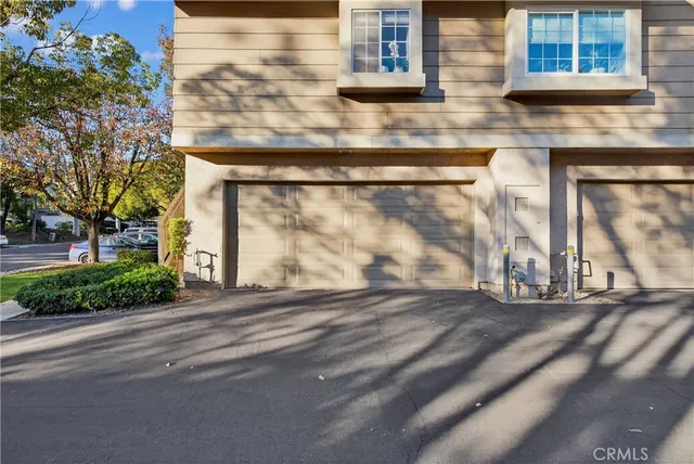 a view of a brick building with many windows