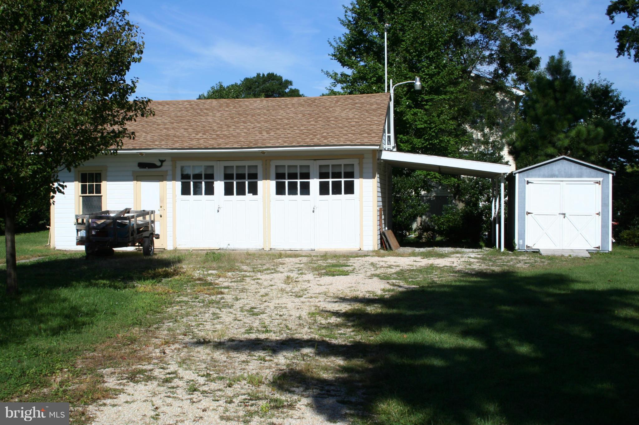 2514 Barrison Point Road Essex, MD 21221 - Photo 2 of 22 a house view with a garden space