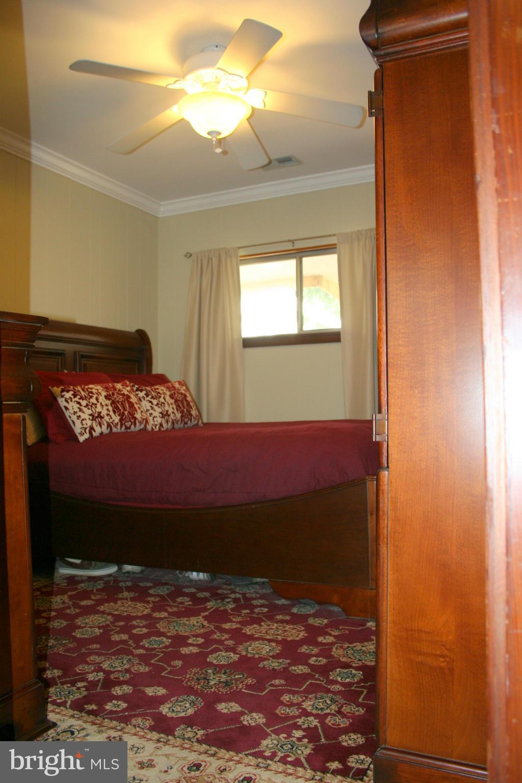 2514 Barrison Point Road Essex, MD 21221 - Photo 13 of 22 a view of room with window and stairs