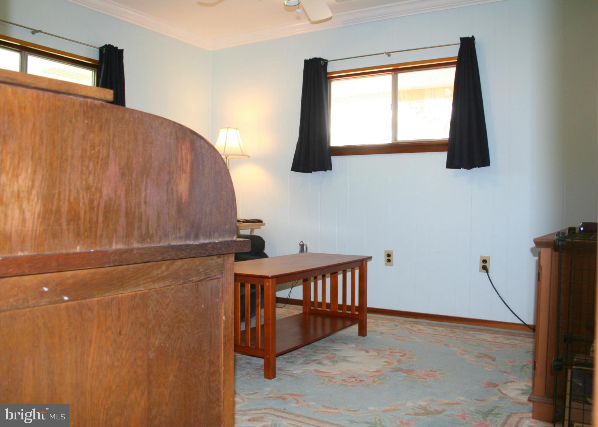 2514 Barrison Point Road Essex, MD 21221 - Photo 14 of 22 a view of a room with window and wooden floor