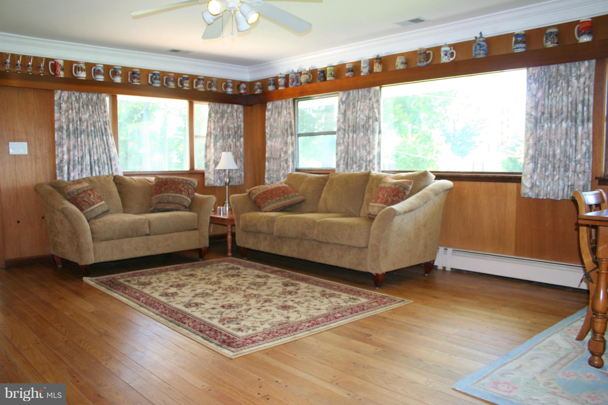 2514 Barrison Point Road Essex, MD 21221 - Photo 4 of 22 a living room with furniture and a large window