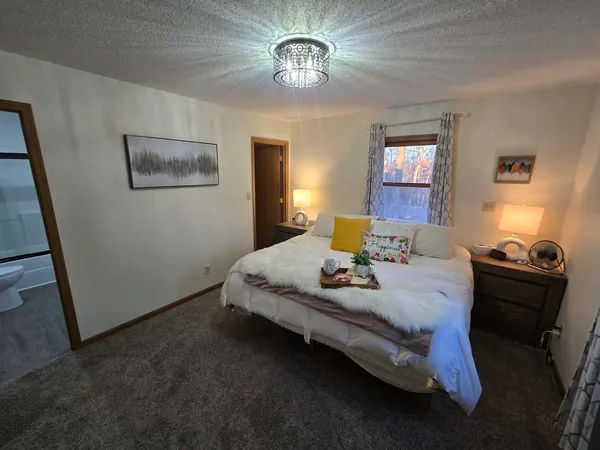 a view of a livingroom with furniture