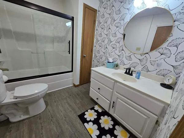 a bathroom with a sink and a toilet