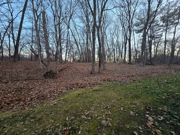 a view of parking area of a house