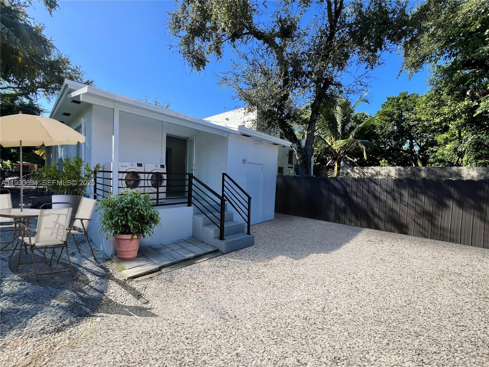 75 Northeast 70th Street Miami, FL 33138 - Photo 13 of 13 Patio furniture and exterior washer and dryer not included.