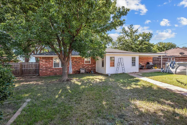 a view of backyard with trees