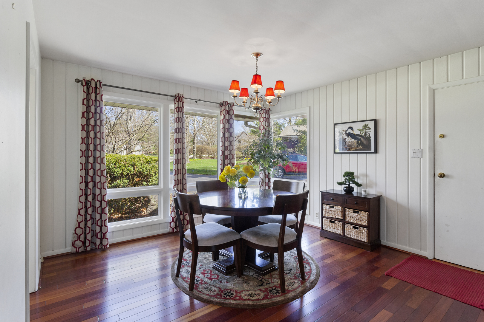 45 Greencroft Drive Champaign, IL 61821 - Photo 11 of 26 a view of a dining room with furniture window and wooden floor