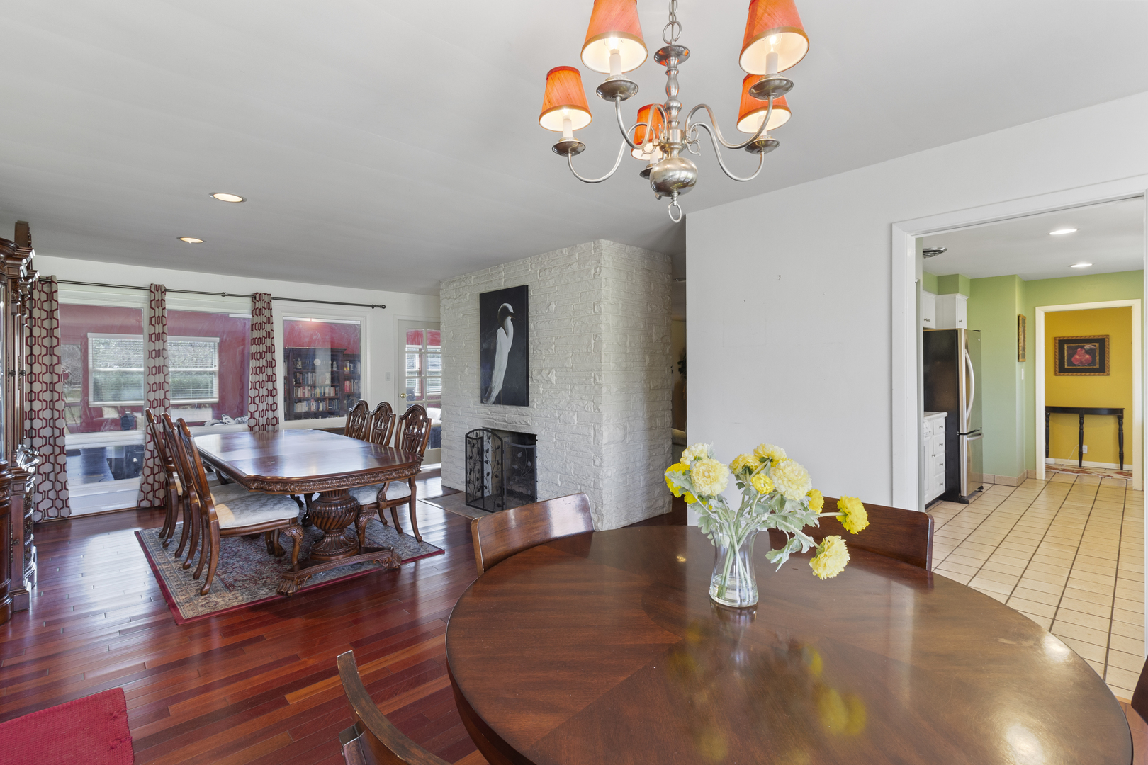 45 Greencroft Drive Champaign, IL 61821 - Photo 12 of 26 a dining room with furniture potted plants and wooden floor