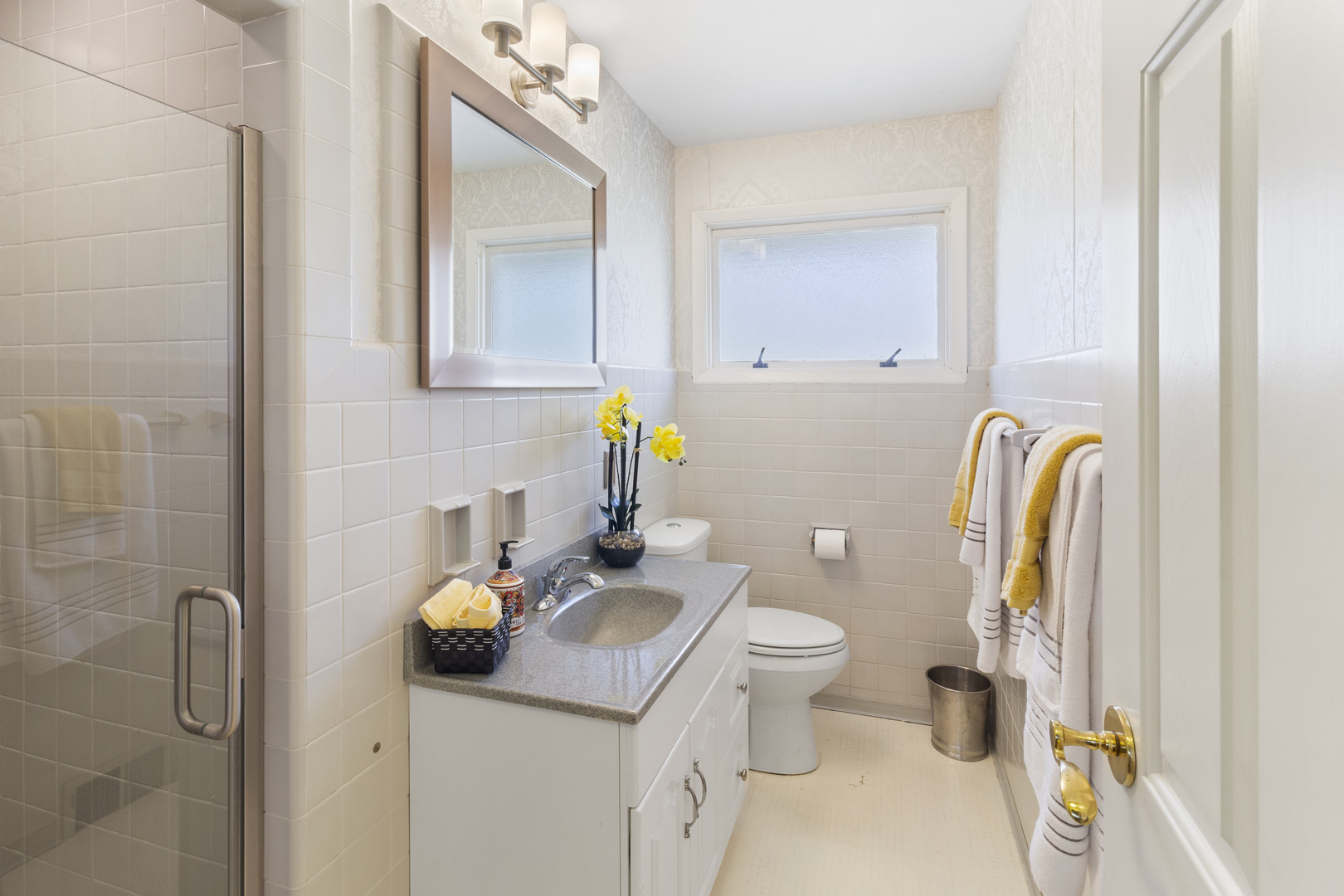 45 Greencroft Drive Champaign, IL 61821 - Photo 16 of 26 a bathroom with a sink toilet and mirror