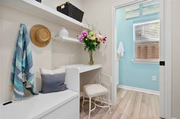 a dining room with furniture and window