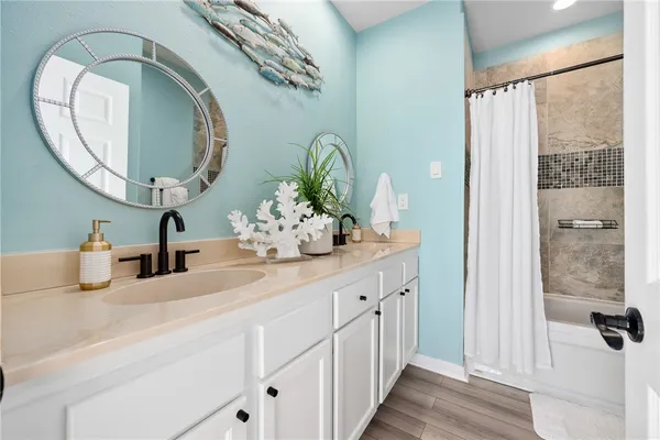 a bedroom with furniture and white walls