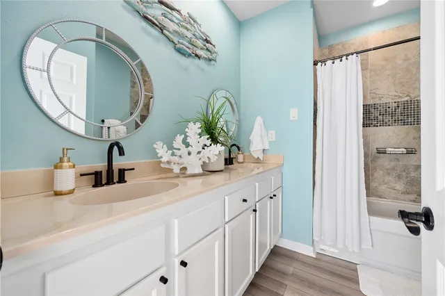 a bedroom with furniture and white walls