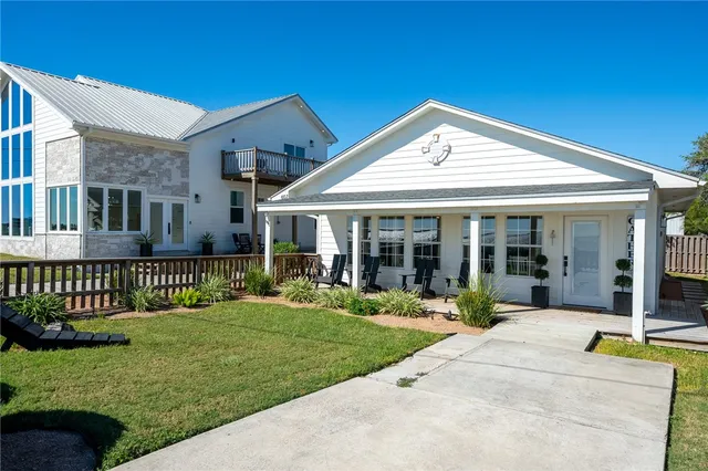 a view of a building with sitting area