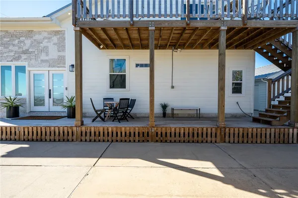 a view of balcony with small potted plants